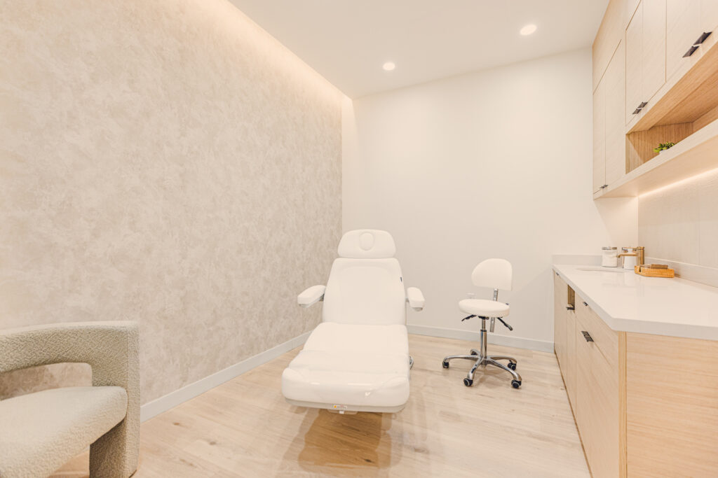 One of our comfortable treatment rooms for microneedling near Centennial Hills, where we have a reclining treatment chair, soft lighting, and ambient music.